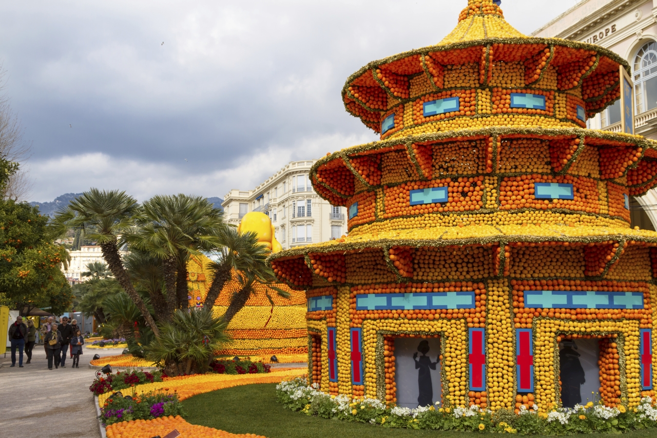 Menton, France - February 20, 2015: Lemon Festival (Fete du Citron) on the French Riviera.The theme for 2015: Tribulations of a lemon in China. Thousands of lemons and oranges are used to build huge citrus constructions